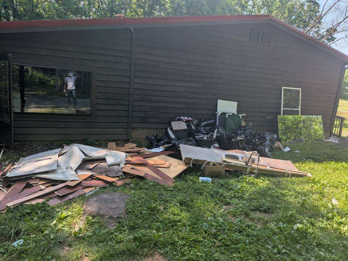 Rehab debris and materials beside 4008 Myra Ct during work in progress