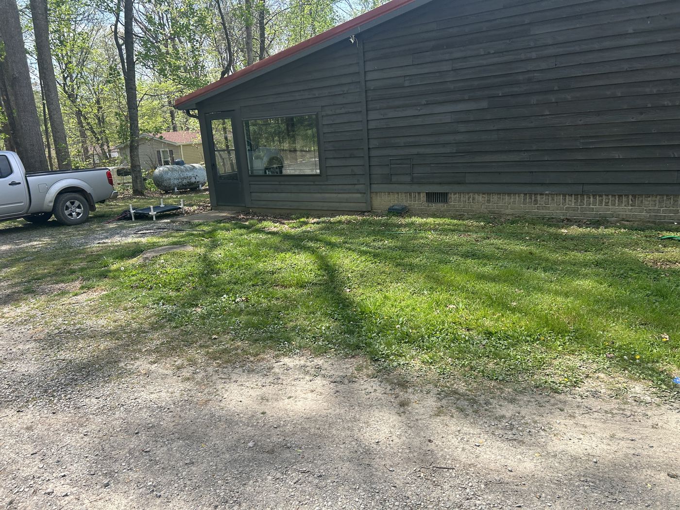 Side elevation and yard at 4008 Myra Ct